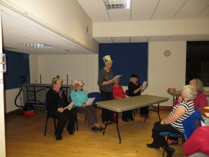 Gill, Doreen, Joyce, Rosie entertaining with a Cinderella skit at the Christmas members' evening